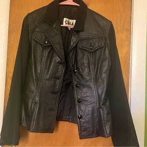 Medium vintage leather jacket with sheer arms